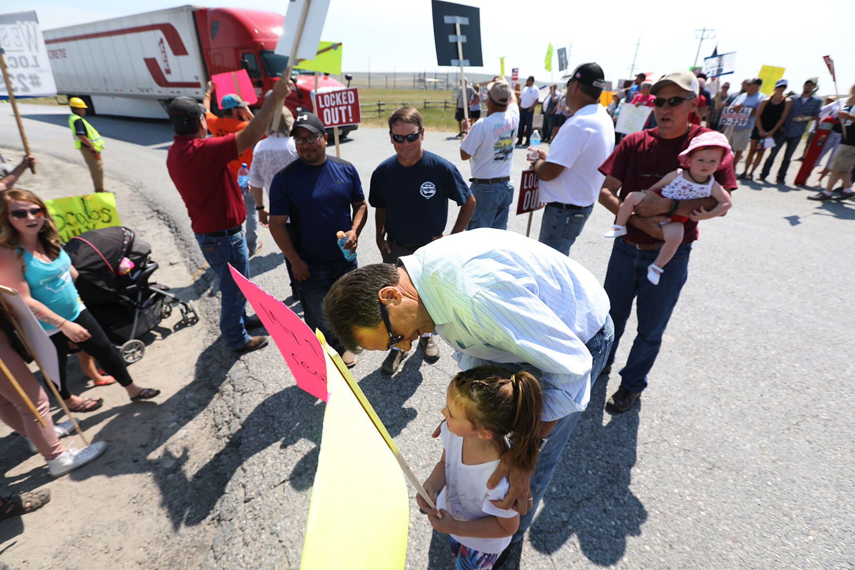 Bullock encourages workers to "stand strong"